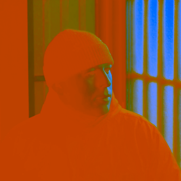 orange and blue tinted portrait of the artist in an machiya in kyoto